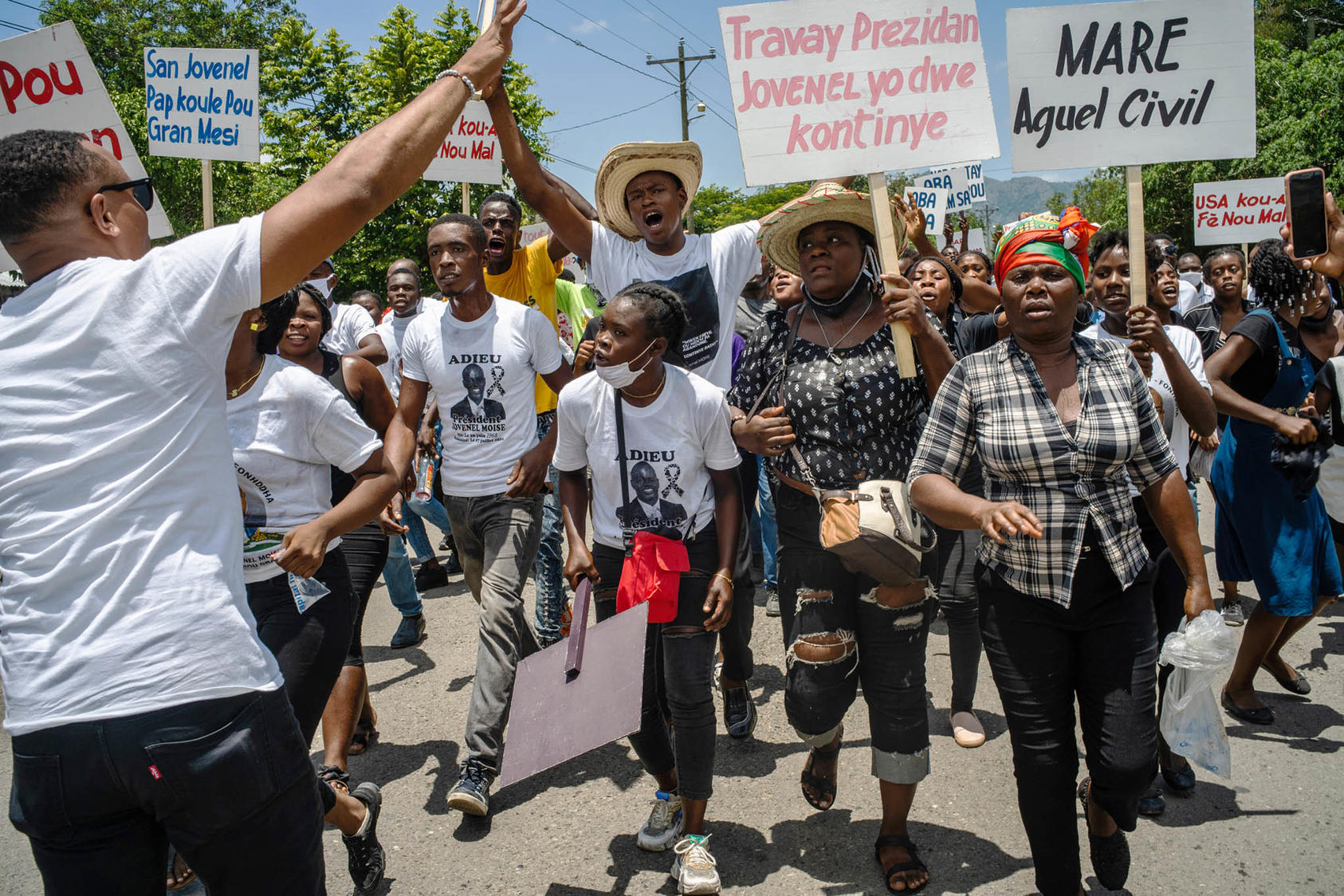 A march in memoriam of slain President Jovenel Moïse in Trou-du-Nord, Haiti, July 16, 2021. (Federico Rios/The New York Times)
